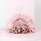 Värmefri lock-scrunchie i rosa och nude